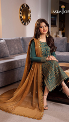 Asma Johar collection display featuring a variety of elegant garments and accessories in a stylish setting.
