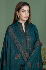 Teal suit with exquisite embroidery, complemented by a distinctive blue and brown print, perfect for formal occasions.
